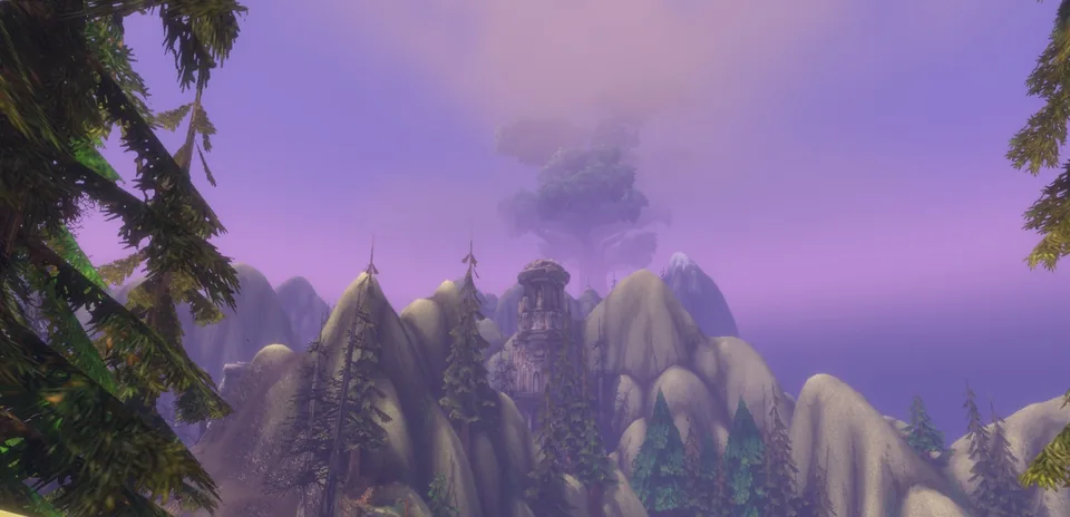 Pine-covered mountain peaks under a violet sky, with a tall shape rising into the clouds in the distance